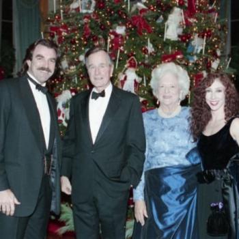 President and Mrs Bush pose for a photo with Tom Selleck and his Wife at reception of Kennedy Center honorees