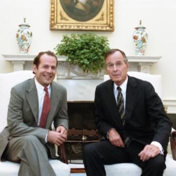 President Bush meets with actor Bruce Willis in the Oval Office