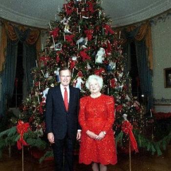 President Bush and Barbara Bush in front of White House Tree