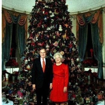 President Bush and Barbara Bush in front of White House Tree