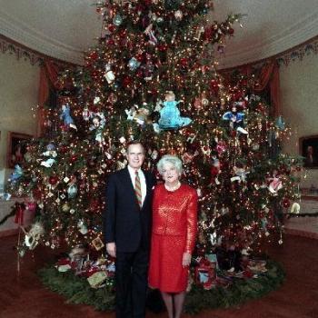 The Bushes pose in front of the 1989 White House Christmas Tree