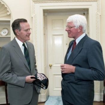 President Bush greets actor and spokesman for National Police Week, Peter Graves, in the Oval Office