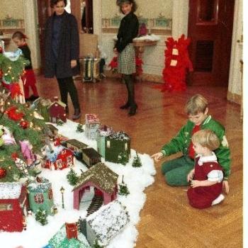 Grandchildren around Christmas Tree