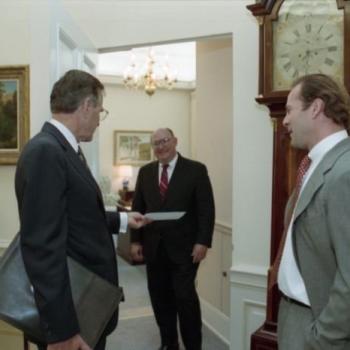 President Bush meets with actor Bruce Willis in the Oval Office