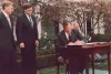 President Bush signs the Civil Rights Commission