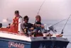 President George Bush fishing with his son, George W. Bush, off Kennebunkport, ME.  13 Aug 1991