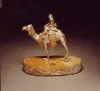 Sculpture of rider on camel Artist