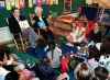 Former President and Mrs. Bush read to school children at Carver Early Learning Center, Bryan, TX.  17-18 Mar 03
