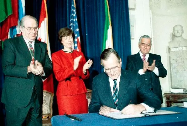 President Bush signs the North American Free Trade Agreement 