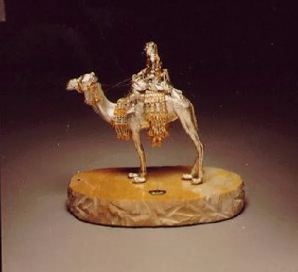 Sculpture of rider on camel Artist