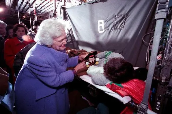 Mrs. Bush greets Armenian children at Andrews Air Force Base.