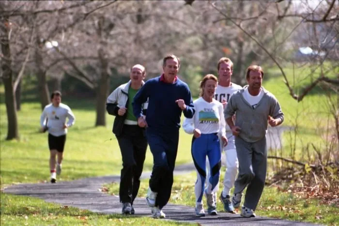 President Bush goes jogging with Chuck Norris and his son Michael on the grounds of the Vice President's Mansion