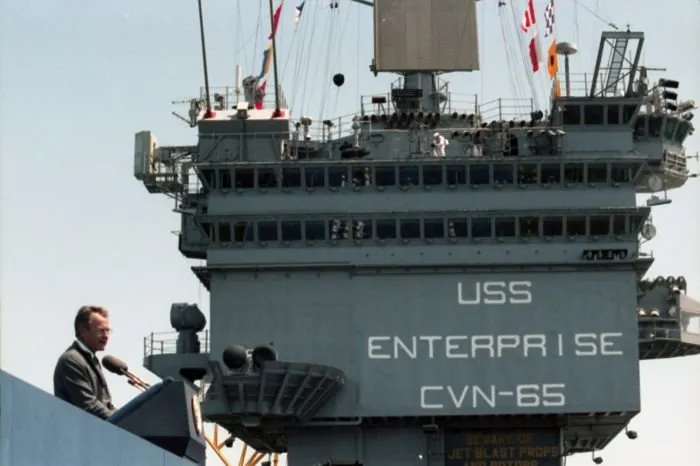 Vice President Bush addresses the audience aboard the USS Enterprise in San Francisco Bay during the "Peace in the Pacific" ceremony marking the 40th Anniversary of VJ Day