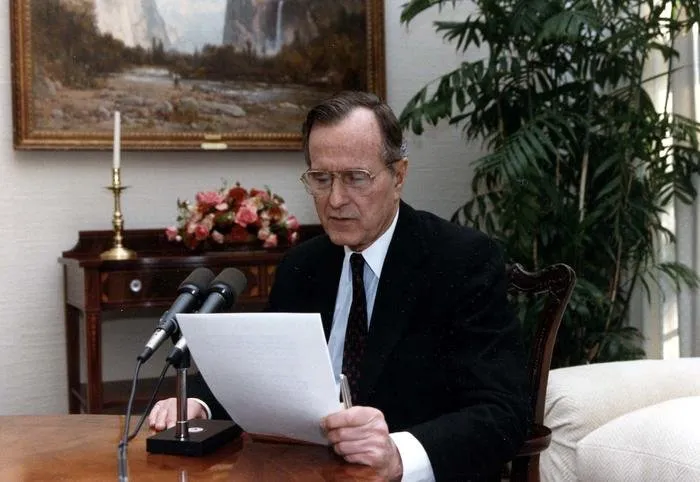 President Bush addresses the nation by radio from the Oval Office Dining Room regarding the US position in the Middle East Crisis