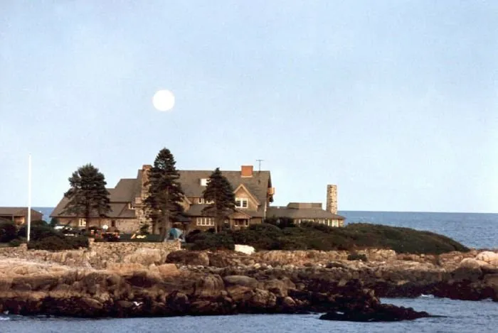 The moon shines over Walkers Point