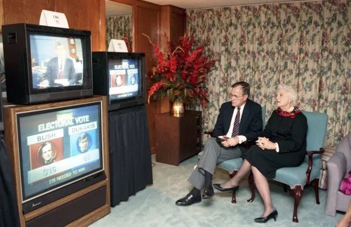 Vice President Bush and Barbara Bush watch the election