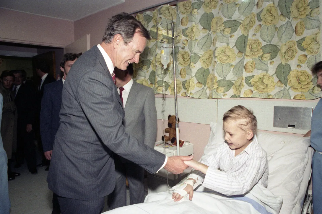 Vice President Bush visits the Leukemia ward in a Children's Hospital in Krakow, Poland