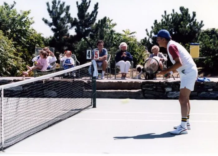 Vice President Bush plays tennis as his family watches at Walker's Point, Kennebunkport, ME,