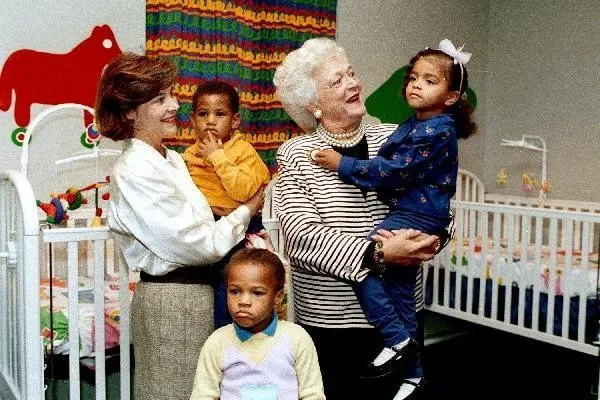 Barbara and Laura Bush visit Bryan's House for Children with AIDS