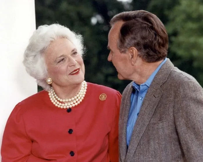 Vice President and Mrs. Bush smile on the porch of the Vice President's residence, Washington, D.C