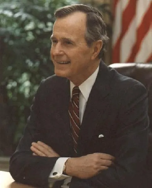 President Bush at desk in Oval Office