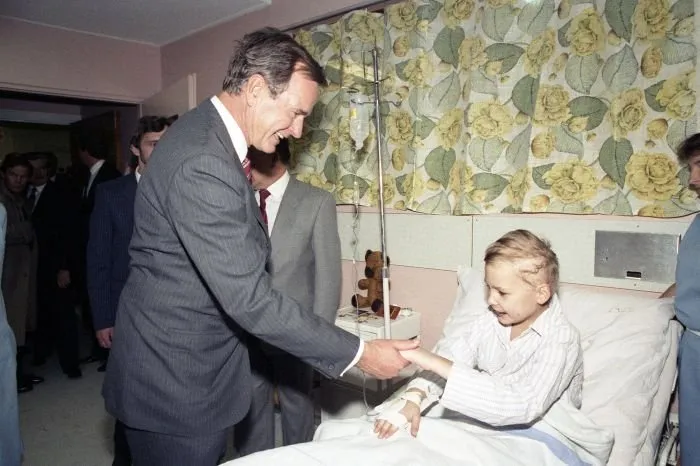 Vice President Bush visits the Leukemia ward in a Children's Hospital in Krakow, Poland
