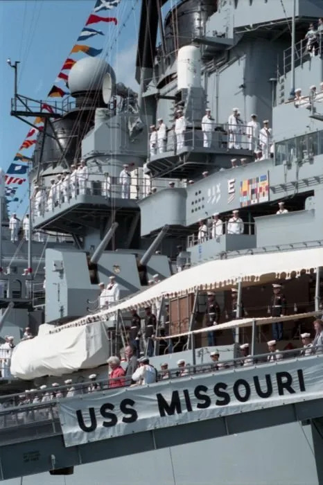 President Bush and Mrs. Bush walk down the gangplank of the USS Missouri in Pearl Harbor, Hawaii on the 50th anniversary of the Japanese attack on Pearl Harbor.