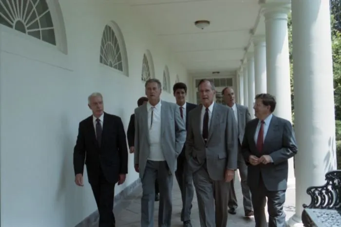 President Bush walks along the Colonnade to West Wing with Dimaggio and Ted Williams