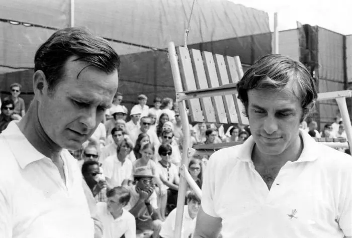 George Bush Plays Tennis with Tennis Player John Newcombe