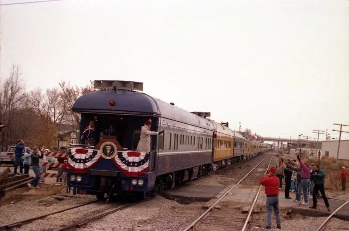 President Bush waves to supporters as "The Spirit of America" pulls out of Oshkosh, WI