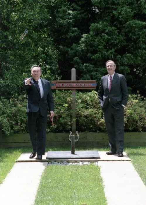 President Bush and President Nursultan Nazarbaev of Kazakhstan pitch horseshoes