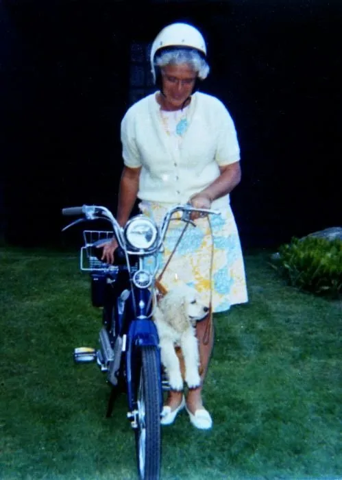 Barbara Bush Prepares for a Moped Ride with C. Fred at Walker's Point