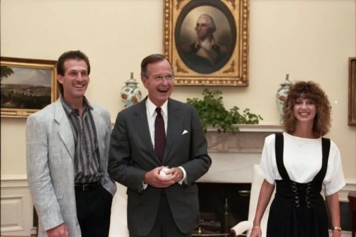 President Bush meets with Nick Esasky and his wife in the Oval Office