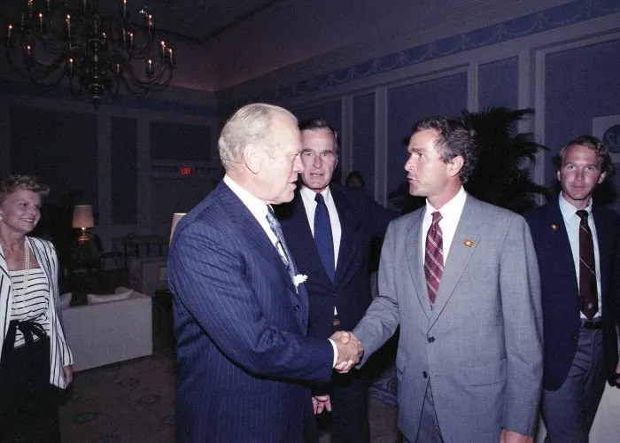 President Bush greets Vice President Bush and members of his family including his son, George W. Bush during a reception honoring President Ford at the Republican National Convention in Dallas, Texas