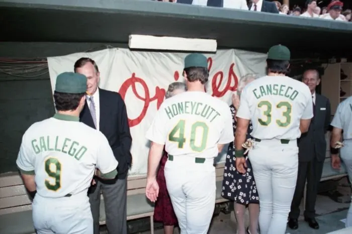 President Bush,  Barbara Bush,  Queen Elizabeth II, and Prince Philip greet Oakland Athletics players Jose Canseco, Rick Honeycutt, and Mike Gallego