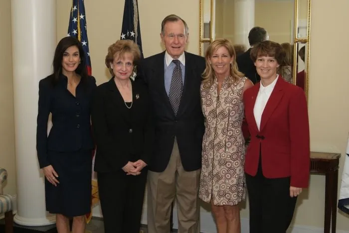 George Bush with Teri Hatcher, Harriet Miers, Chris Evert, and Eileen Collins