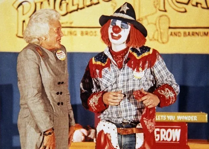 Barbara Bush Reacts as Clown Jokes with her During Presentation to School Children