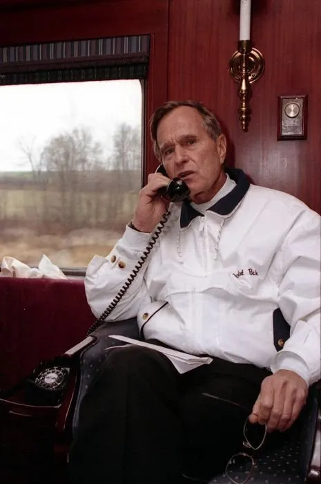President Bush gives a telephone interview aboard "The Spirit of America"