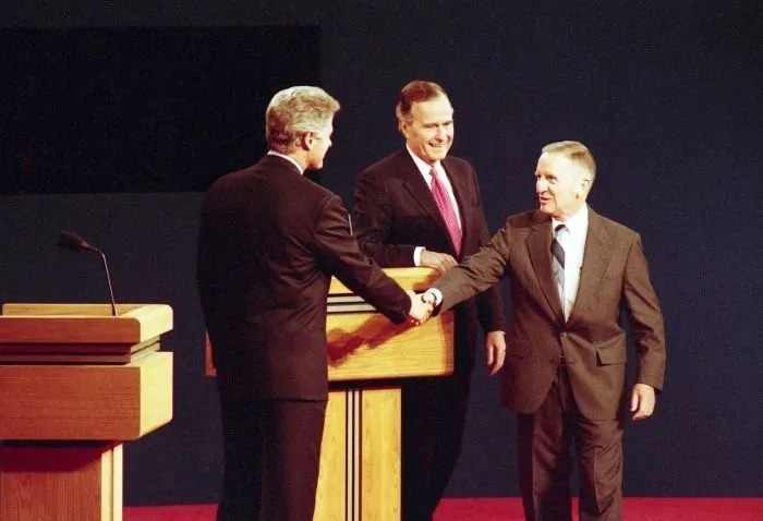 President Bush participates in the third and final Presidential Debate between himself, Governor Bill Clinton, and Ross Perot in East Lansing, Michigan