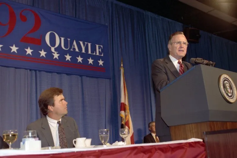 President Bush addresses a Bush-Quayle fundraising dinner where dias participants include Jeb Bush