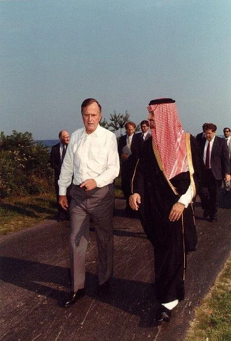 President Bush walks along driveway with Saudi Foreign Minister at Walker's Point
