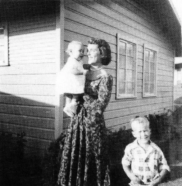 Barbara Bush Holding Robin, with George W.