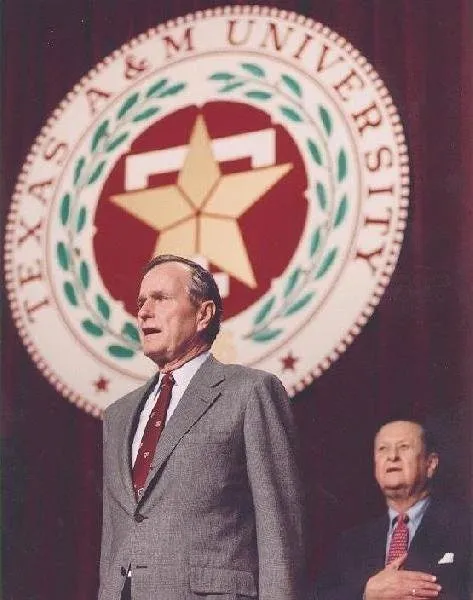 President Bush sings National Anthem with faculty and students at Texas A&M