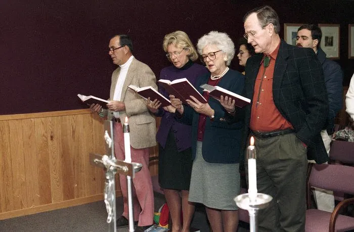 President and Mrs. Bush attend church services at Camp David with friends Spike and Betsy Heminway