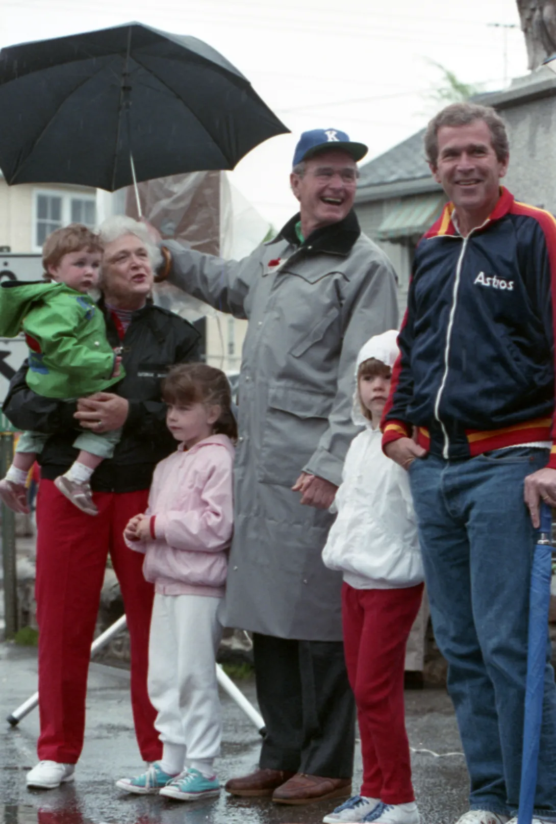 Vice President Bush and Mrs. Bush attend the Memorial Day parade in Kennebunkport, Maine with their family, including their son, George W. Bush
