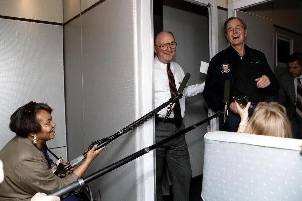 President Bush shares a laugh with Marlin Fitzwater