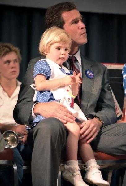 Vice President Bush addresses a Reagan/Bush rally in Midland, Texas accompanied by his wife Barbara, and his son, George W. Bush, with his wife, Laura, and their twin daughters, Jenna and Barbara