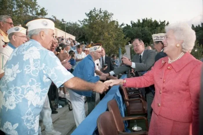 President and Mrs. Bush greet Pearl Harbor Survivors and their families at a ceremony commemorating the 50th anniversary of the Japanese attack