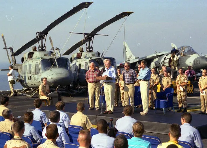 President Bush participates in Thanksgiving church services aboard the USS Nassau, in the Persian Gulf