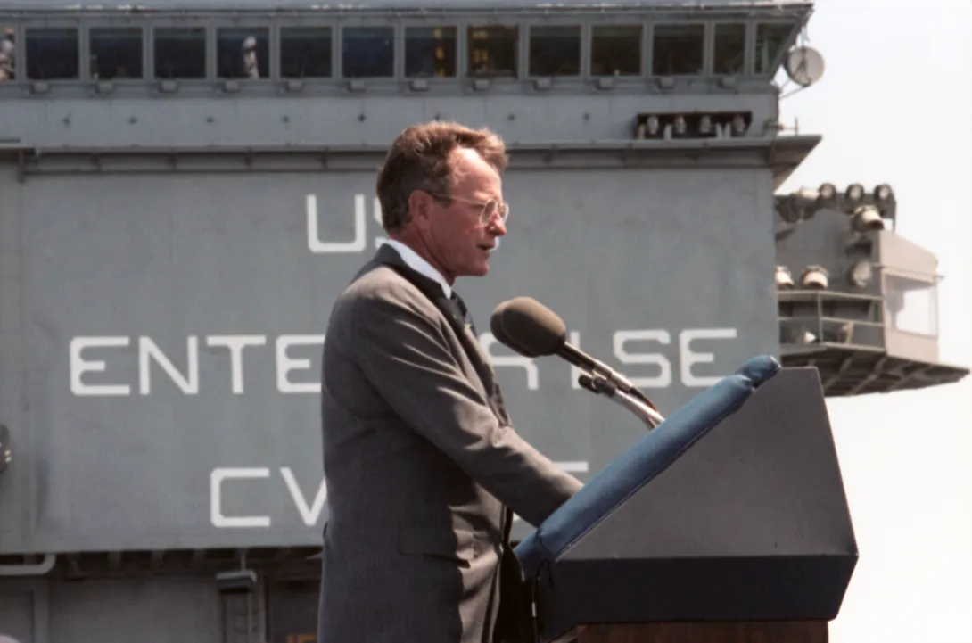 Vice President Bush addresses the audience aboard the USS Enterprise in San Francisco Bay during the "Peace in the Pacific" ceremony marking the 40th Anniversary of VJ Day